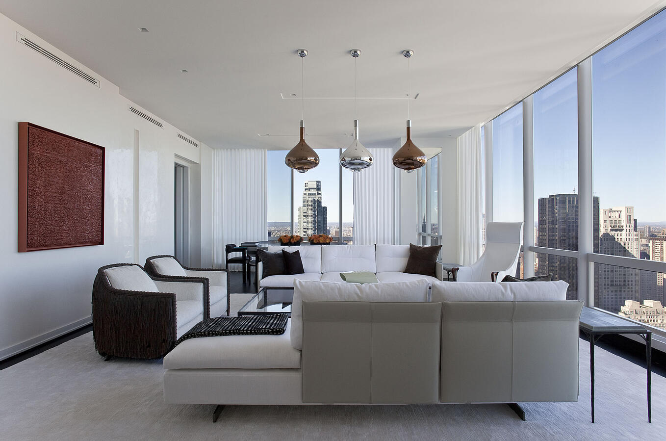 A white soaking bathtub in a brightly lit bathroom